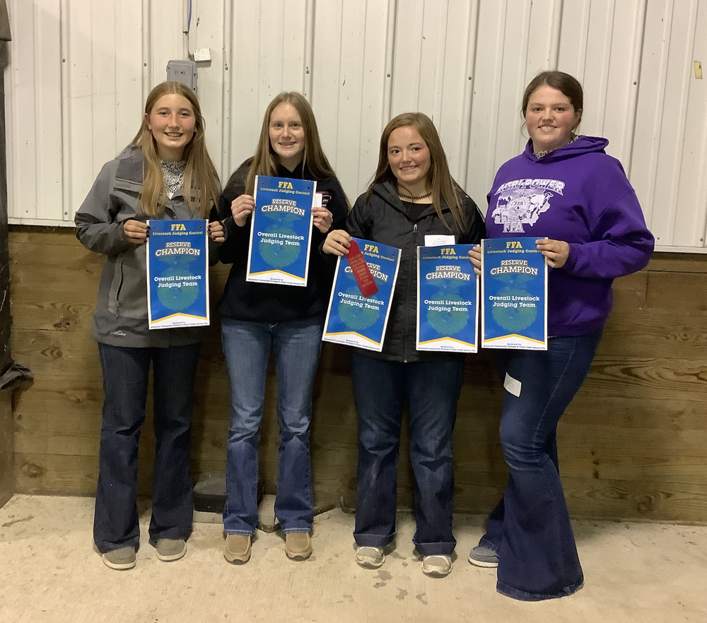 Picture of four EBF FFA students with their awards