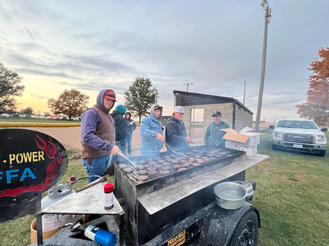 Six EBF Agri-Power members work the grill at the EBF home football games